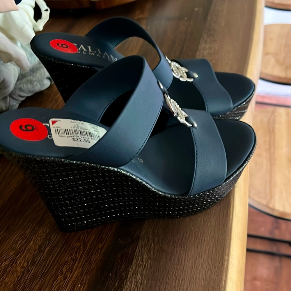 Size six  blue & black platforms, never worn
